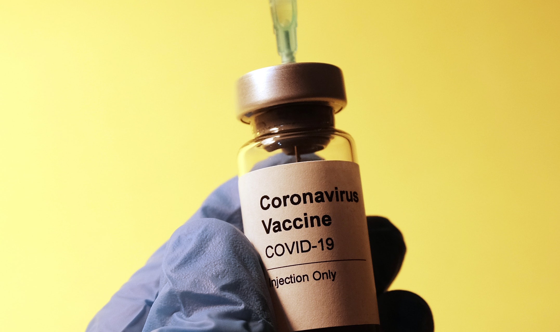 COVID vaccine vial being filled