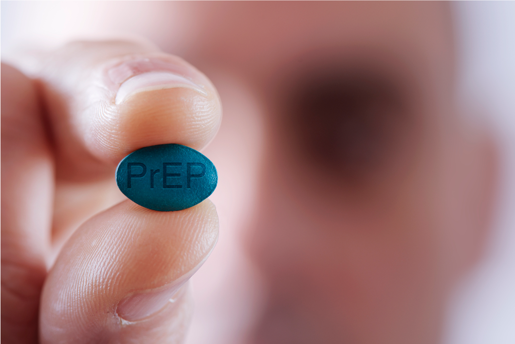 Person holding a Pre-exposure prophylaxis (PrEP) pill